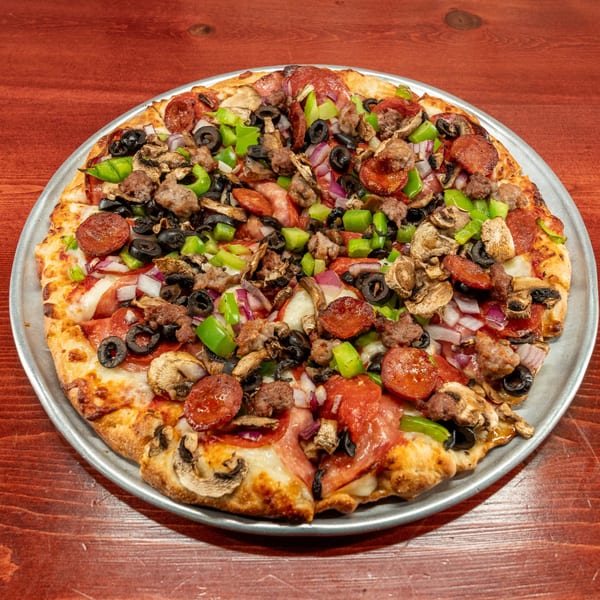 A Corsaro's Family Pizza with pepperoni, sausage, mushrooms, green peppers, black olives, and onions.