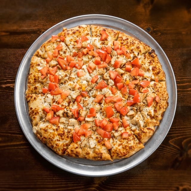 Gourmet garlic chicken pizza.